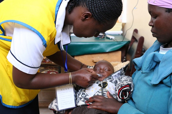 A young child receives the rotavirus vaccination at a clinic in Kenya. 