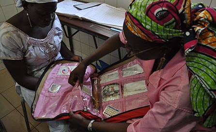 Two women review family planning choices in Mali