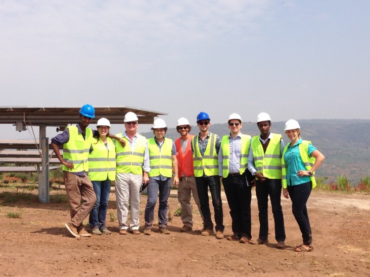 Peter Ballinger (third from left) at the site of a solar project being developed in Rwanda.
