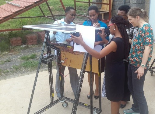 VOCTEC Instructor Carol Weis guides trainees through exercises that help them learn optimal solar panel orientation.