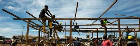 Construction crews work quickly to build a new Ebola Treatment Unit in Liberia.