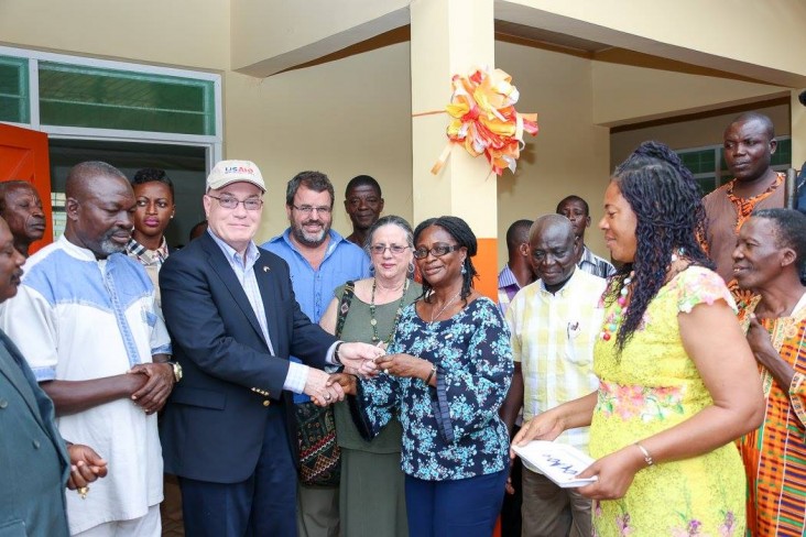 Amb Jackson hands over the keys to the new KG block to the Western Regional Director of Education