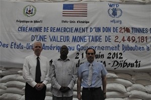 Officials gather in Djibouti to mark the food aid ceremony.