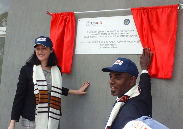 USAID Representative Sophia Brewer and the mayor of Hawassa uncover a plaque for the new Finchawa Health Center.
