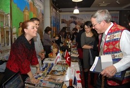 US Ambassador to Armenia John Heffern stops by the visitor booth of Turkish partners at the event.