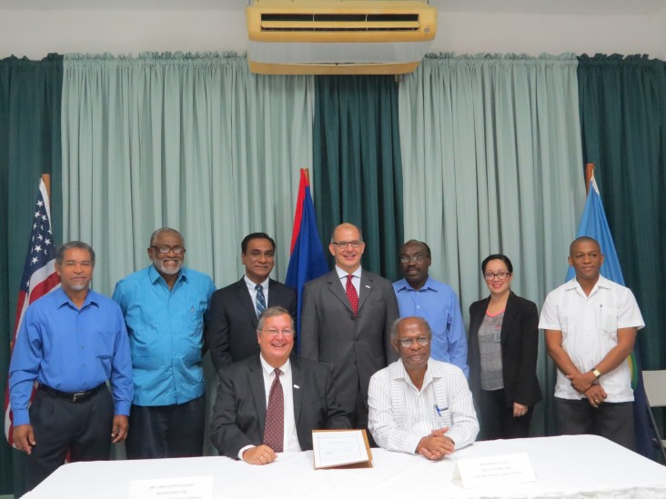 Officials take a photo minutes after the official signing to launch the Climate Change Adaptation Program (CCAP). 