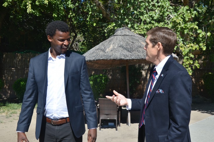 Ambassador Miller discusses the USAID initiative and its community-rooted approach with YALI Fellow, Monametsi Sokwe. 