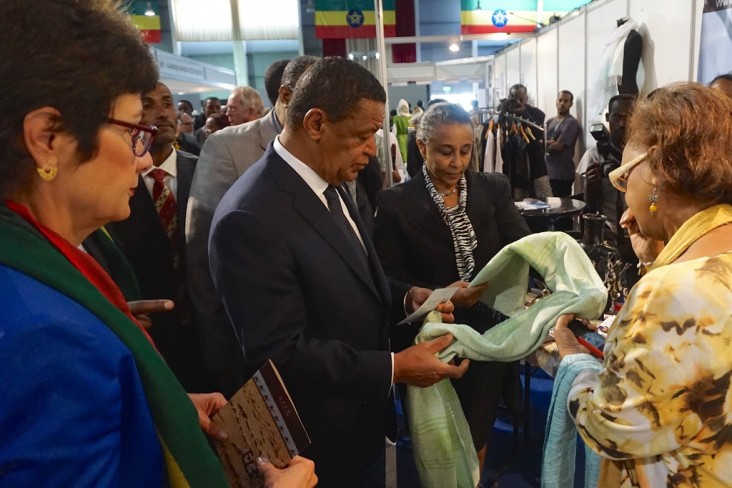 Ethiopian President Mulatu Teshome and U.S. Ambassador Haslach look at merchandise from one of the exhibits at the fifth Origin 