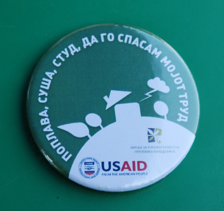 Motto of the Caravan written on a magnet, part of the promotional materials