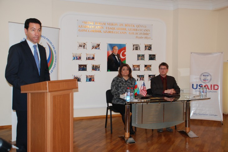 U.S. Embassy Charge d'Affaires speaks at the signing ceremony