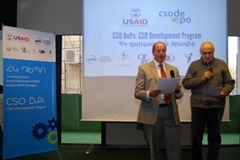 Head of USAID Armenia Program Office, Mervyn Ellis, speaks at the public launch of the CSO DePo program.