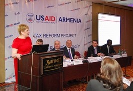 USAID Armenia Mission Director Karen Hilliard speaks at the public presentation of survey results.