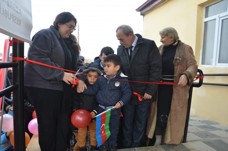 Children join the opening of the renovated kindergarten in Cholbeshadli, Sabirabad.