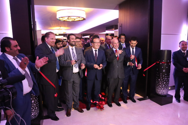 U.S. Ambassador P. Michael McKinley and Afghan officials cut ribbon to open the premier Exhibition Afghanistan, Dubai.