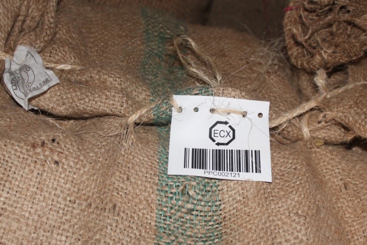 A traceability tag on a sack of coffee ready for export.