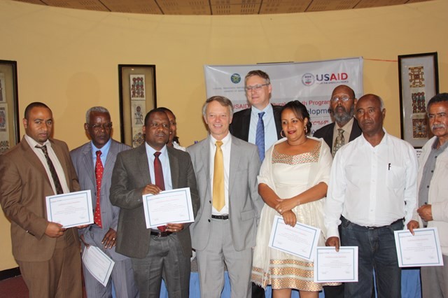 New grantees pose with USAID Ethiopia Mission Director Dennis Weller (center front) and CNFA Chief of Party Marc Steen.