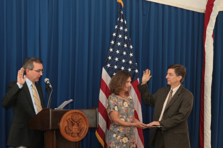 Dr. Andrew Sission being sworn in as mission director to Indonesia