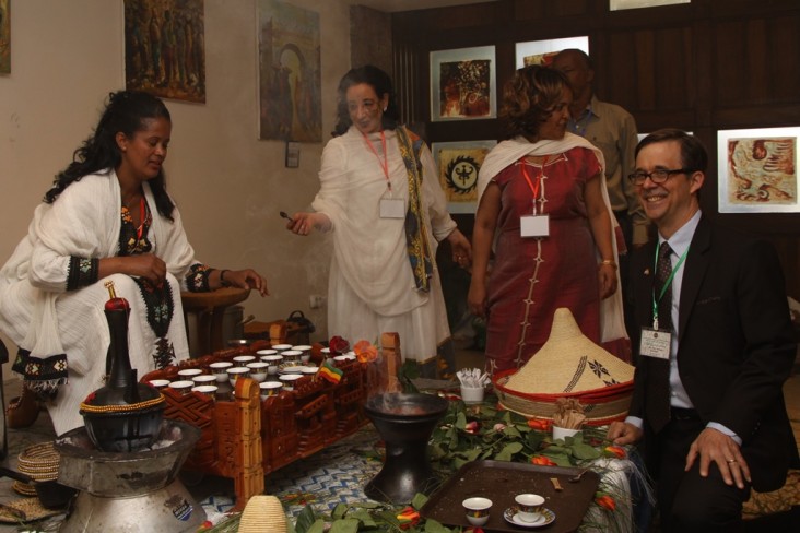 U.S. Deputy Chief of Mission Peter Vrooman appreciates a traditional Ethiopian coffee ceremony.