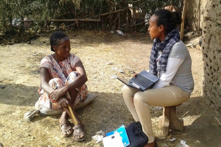 A field worker (right) is interviewing a woman as part of the training to conduct the EDHS.