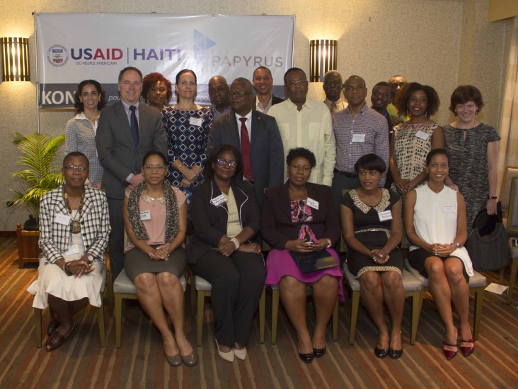 USAID Haiti Mission Director Jene Thomas with representatives from local civil society organizations and businesses.