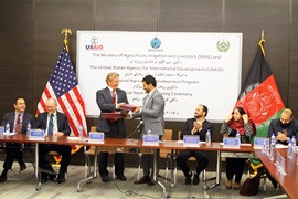 USAID Mission Director Herbie Smith and Minister of Agriculture, Irrigation and Livestock Assadullah Zamir signed an agreement.