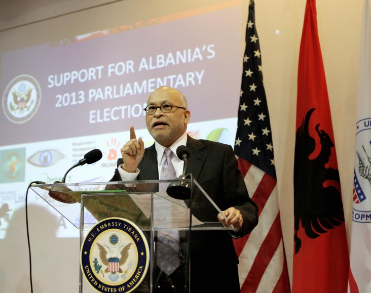 Ambassador Arvizu delivers remarks at a podium