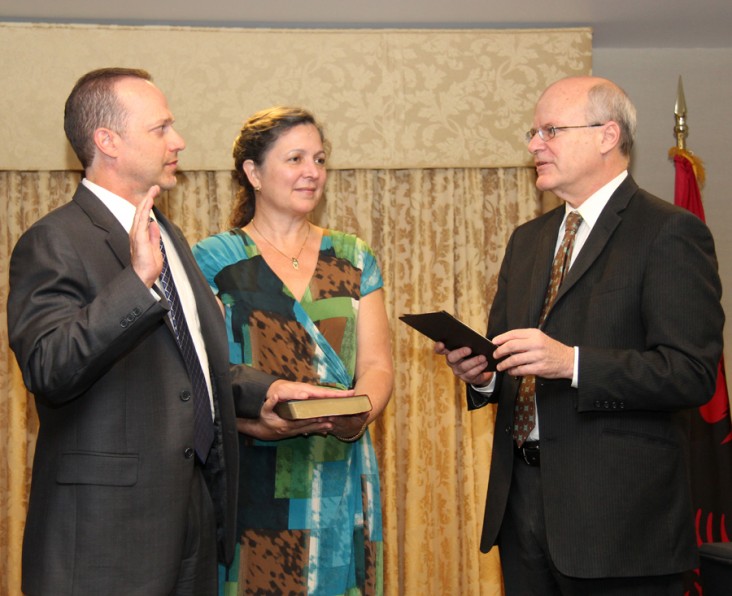 Dr. Jim Barnhart is sworn in as USAID/Albania mission director. Credit: Patricia Adams/USAID