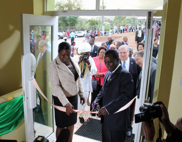 Prime Minister of Grenada Sir Keith Mitchell and Minister of Social Development , Delma Thomas, cut the ribbon