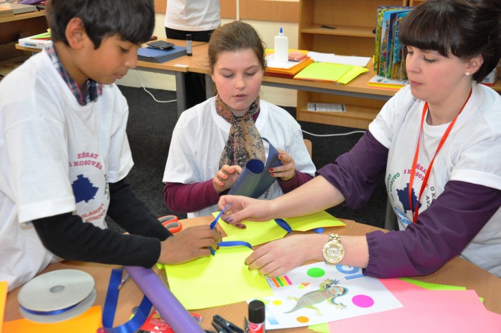 English speaking students from American School of Kosovas and their teacher during bookmaking activity.