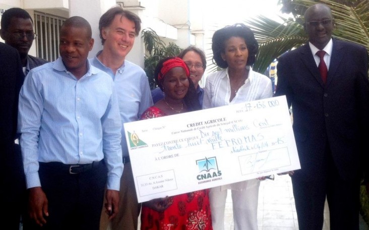 FEPROMAS producers receiving $30,000 check from the insurance company