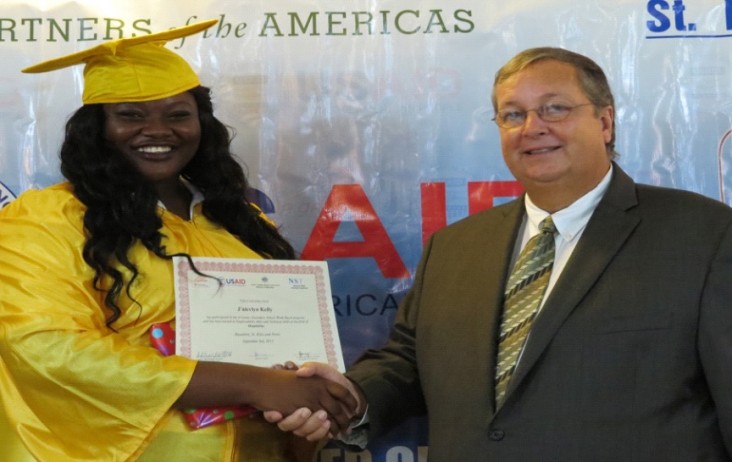 J’nievlyn Kelly of Washington Archibald High School, receives her prize