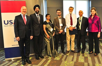 Urban Resilience Competition Recognition Award winners (center) pose with USAID and UN officials.