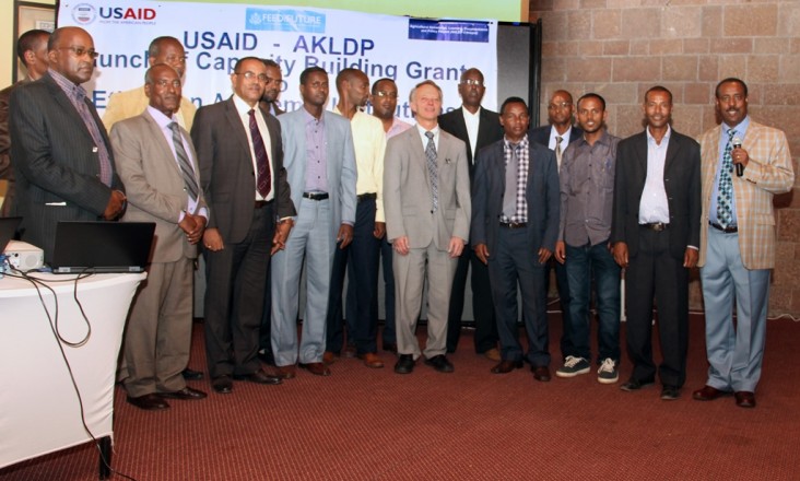 USAID Ethiopia Mission Director Dennis Weller (center) with representatives of the grant recipient organizations and project sta