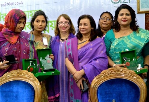 Image of USAID/Bangladesh Mission Director Janina Jaruzelski and women champions in Dhaka.