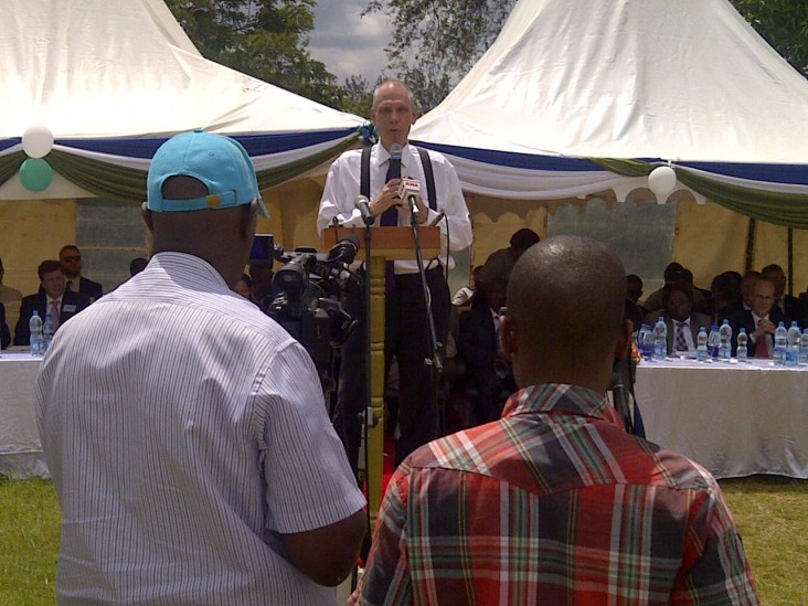 The U.S. Ambassador to Kenya delivers a speech behind a podium.