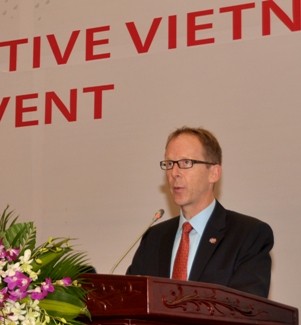 USAID Mission Director Joakim Parker addresses the workshop in Hanoi.