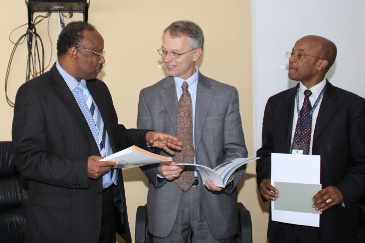 USAID Ethiopia Mission Director Dennis Weller discusses new textbooks with Ministry of Education officials.