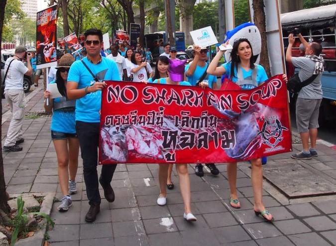 Fin Free Thailand supporters take to the streets to lessen the taste for shark fin soup. 
