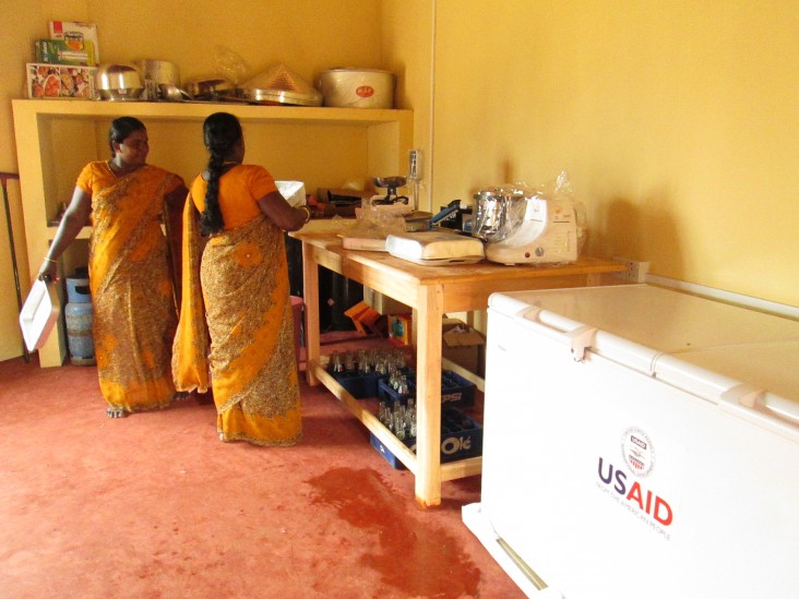 Women from Kallappadu North set up operations at their newly opened food processing center.