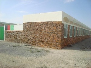 Kandahar residents worked with the international community to refurbish the Aloku School in Dand district, Kandahar province.