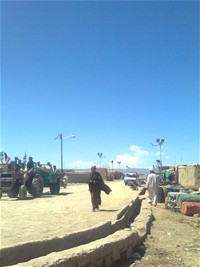 Newly installed solar streetlights line the road through Jani Kheyl bazaar.