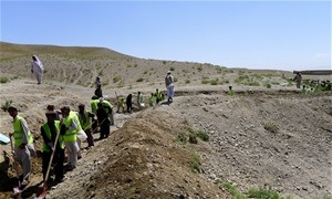 Workers build an irrigation canal in Khairkut District, Paktika Province.