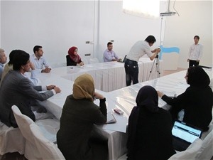 Members of women’s organization and other Hirat citizens receive training in how to use a simple video camera at the new Hirat M