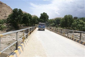 A truck crosses the Mamand Bridge.