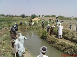 Laborers clear the Khalach Canal, improving farming capacity in Hilmand’s Nawa District.