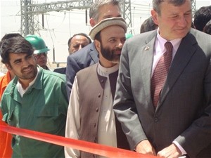 U.S. Ambassador Karl Eikenberry (right) is joined by (right to left) Minister of Economy Abdul Hadi Arghandiwal, USAID Mission D