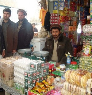 Cartons of eggs stand in the front of Abdul Naser’s market stall in Kishim, Badakhshan Province.
