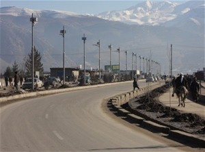 Newly installed solar streetlights line the road into Fayzabad in Badakhshan Province. The road itself, which links Fayzabad wit
