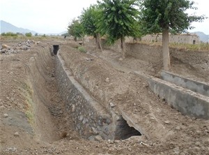 This canal near the village of Sperwan Ghar in Kandahar Province now delivers water to local farms. More than 1,800 laborers rem