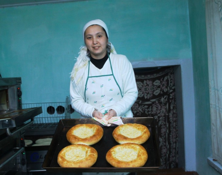 Nurjamal by the freshly baked bread